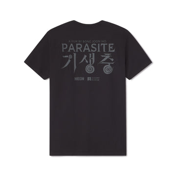 Black t-shirt with Academy Award winning film logo 'Parasite' movie text on the back against a white background exclusive design by NEON and the Academy Museum